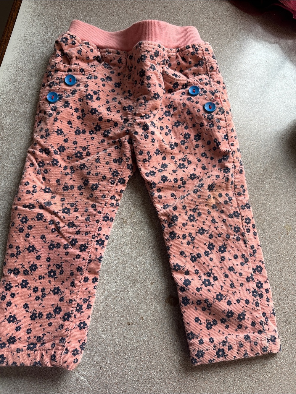 Peach Floral Baby Pants with Blue Button Accents
